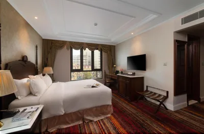 Camera matrimoniale o doppia con letti singoli Deluxe con vista sulla città — The Lapis Hotel